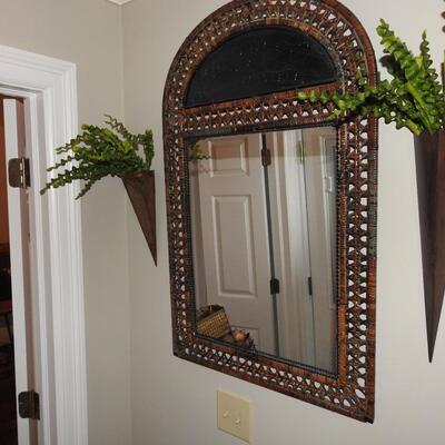 Arched rattan framed mirror