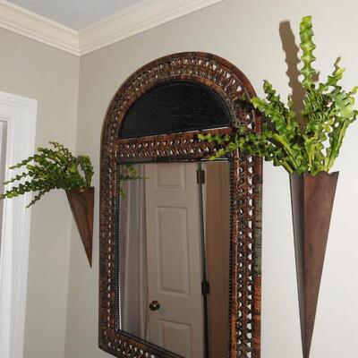 Arched rattan framed mirror