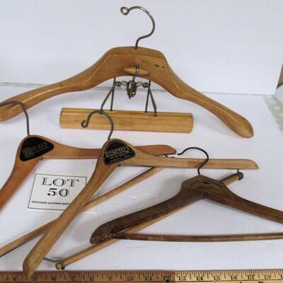 Lot of Vintage Solid Wood Advertising Hangers