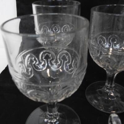 14 pc Crystal.  8 cups, 2 serving plates, 1 Pitcher and 3 wine glasses