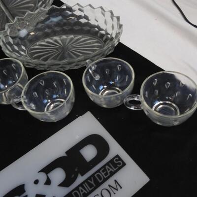 14 pc Crystal.  8 cups, 2 serving plates, 1 Pitcher and 3 wine glasses