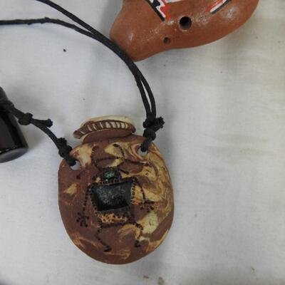 Native American style decor: Arrow heads , Ocarina, homemade clay pot