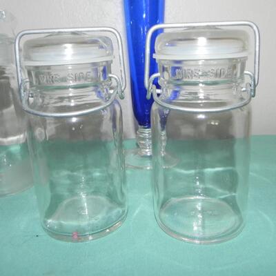 LOT 23 SMALL CANISTERS & BLUE BUD VASE