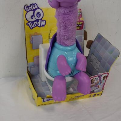 Gotta Go Turtle by Little Live Pets.  Includes Toliet and aqua sand.  Used