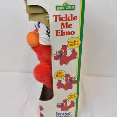 Tickle Me Elmo by Tyco for Ages 1 1/2 and up - Used