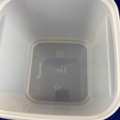 2 Tupperware modular mates with red lids. 11 cup and 17 cup #2 and #3