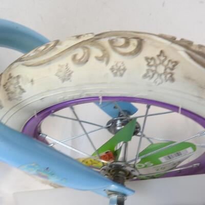 12" Wheel Kid Bike with Frozen Decals.  Rider Height: 2'0"-3' 2" Good Condition