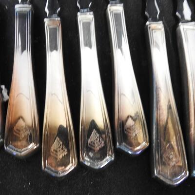Stainless Steel Silverware: 26 Forks, 30 Knives