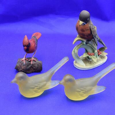 2 yellow, cardinal, brown and orange bird