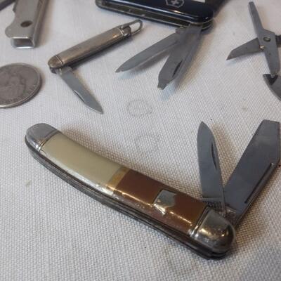 Grouping of 7 Pocket Knives