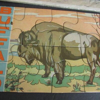 Vintage Flintstones, Sword in the Stone Disney, and Buffalo Puzzles