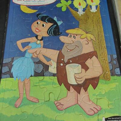 Vintage Flintstones, Sword in the Stone Disney, and Buffalo Puzzles