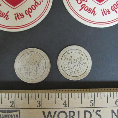 2 Unusual Original Chief Oshkosh Cardboard Tokens and 5 Unused Chief Oshkosh Coasters
