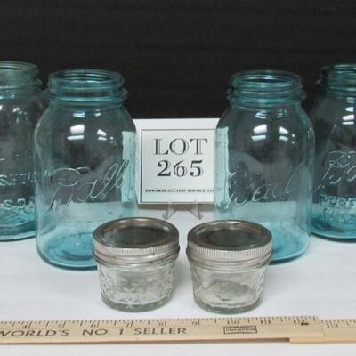 4 Old Teal Canning Jars and 2 Small clear Jars