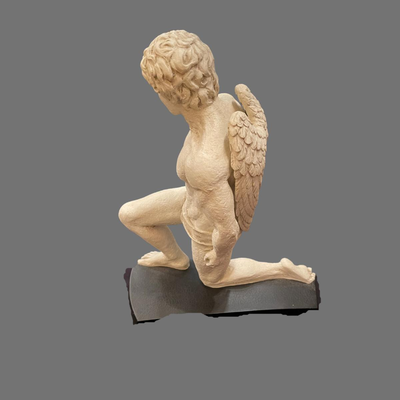 Large Kneeling Cupid Statue on Display Board