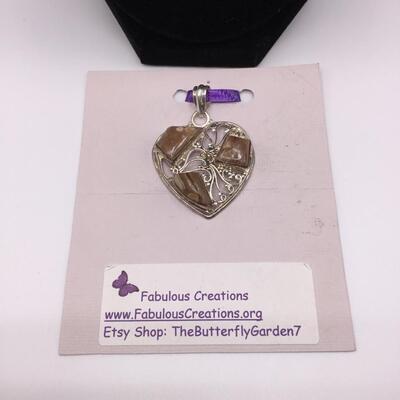 LOTJ139: Honey-Brown Rhodochrosite in Heart-Shaped Silver Pendant