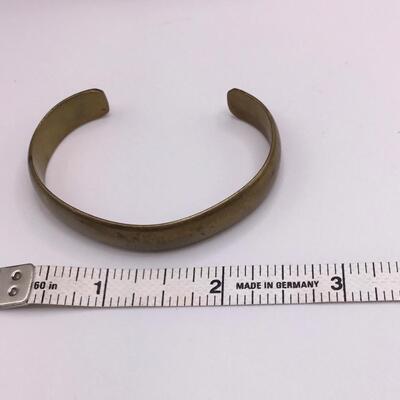 LOTJ158: Four Costume Bracelets - Metal, Wood, Plastic