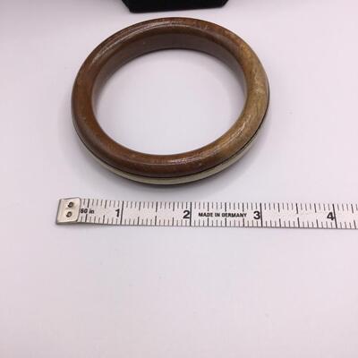 LOTJ158: Four Costume Bracelets - Metal, Wood, Plastic