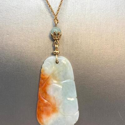 LOT:7:  Natural Carved Bi Colored Jade Pendant Necklace