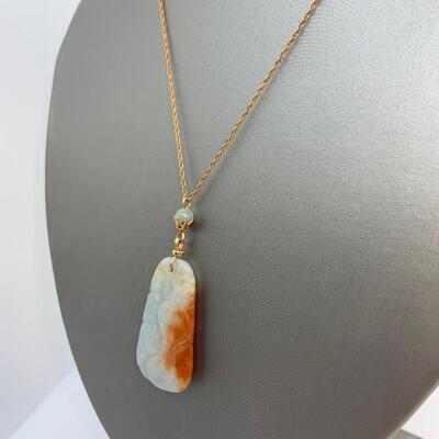 LOT:7:  Natural Carved Bi Colored Jade Pendant Necklace