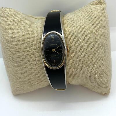 LOT:8: Sheraton 17 jewel Black Oval Face Enamel Watch