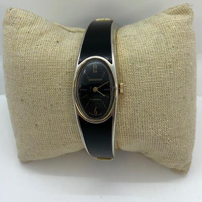 LOT:8: Sheraton 17 jewel Black Oval Face Enamel Watch