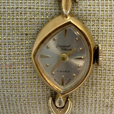LOT:13: Antique Germinal Voltaire 17 Jewel Ladyâ€™S Gold-tone stretch band Wristwatch