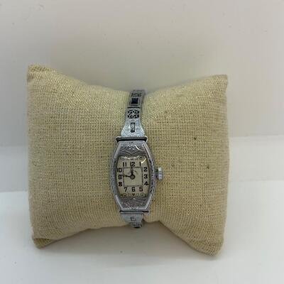 LOT:14: Antique Ollendoraff Ladyâ€™s Wristwatch fillagree band inset Blue Gem
