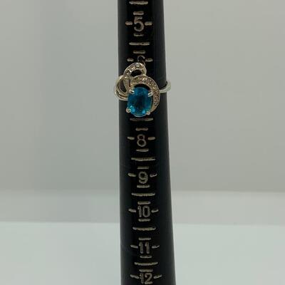 LOT:41: 2 Sterling Silver Rings One Blue Topaz, one Simulated Diamond