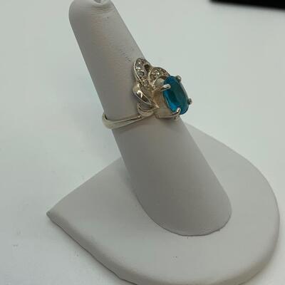 LOT:41: 2 Sterling Silver Rings One Blue Topaz, one Simulated Diamond