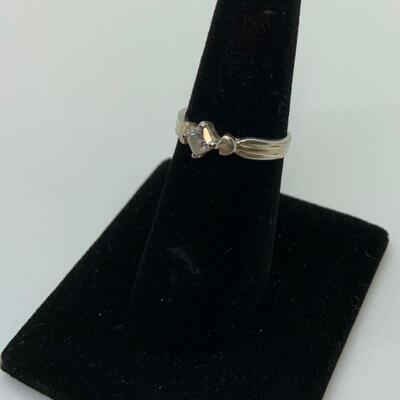 LOT:41: 2 Sterling Silver Rings One Blue Topaz, one Simulated Diamond