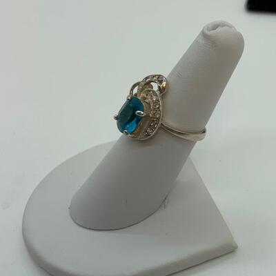 LOT:41: 2 Sterling Silver Rings One Blue Topaz, one Simulated Diamond