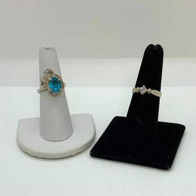 LOT:41: 2 Sterling Silver Rings One Blue Topaz, one Simulated Diamond