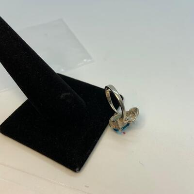 LOT:41: 2 Sterling Silver Rings One Blue Topaz, one Simulated Diamond