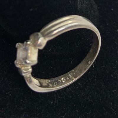 LOT:41: 2 Sterling Silver Rings One Blue Topaz, one Simulated Diamond
