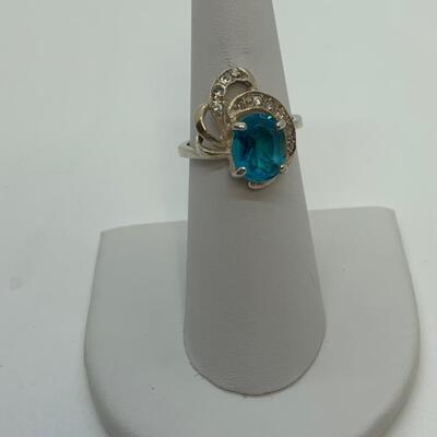 LOT:41: 2 Sterling Silver Rings One Blue Topaz, one Simulated Diamond