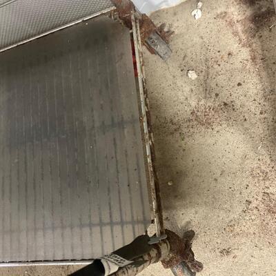 S88 Metal shelving on wheels, 75 and three-quarter inches tall, 18 inches deep, 47 1/2 inches wide. Has rust