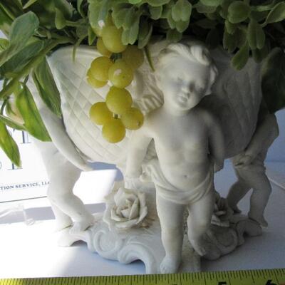 Vintage Figural Planter With Plastic Plant