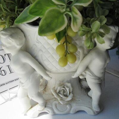 Vintage Figural Planter With Plastic Plant
