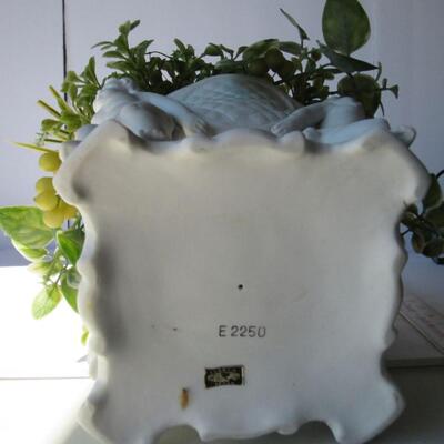 Vintage Figural Planter With Plastic Plant