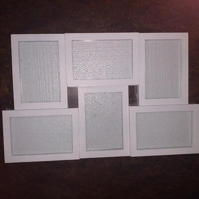 Picture frame - holds 6 photos