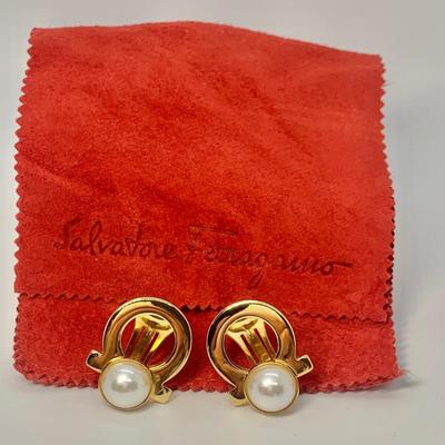 LOT 31: Salvatore Ferragamo Clip On 1â€ Wide Pearl Earrings