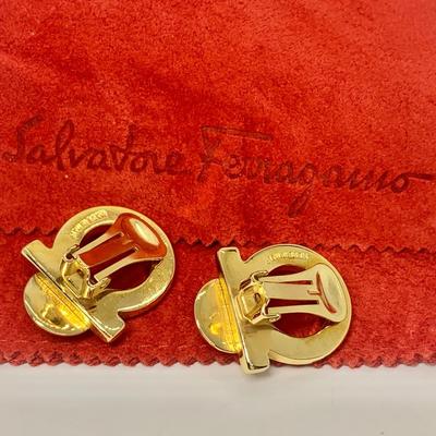 LOT 31: Salvatore Ferragamo Clip On 1â€ Wide Pearl Earrings