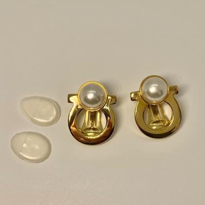 LOT 31: Salvatore Ferragamo Clip On 1â€ Wide Pearl Earrings