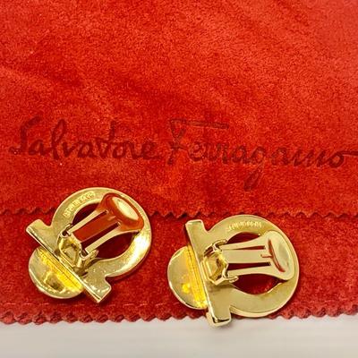 LOT 31: Salvatore Ferragamo Clip On 1â€ Wide Pearl Earrings