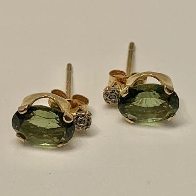 LOT 52: 14k  0.7g Green Tanzanite & Diamond Chip Pierced Stud Earrings