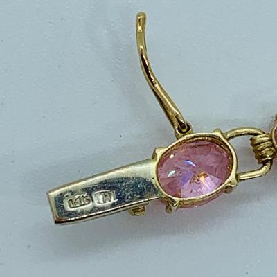 LOT 55: Pink Gemstone 7" 14K Gold Tennis Bracelet - 11 gtw