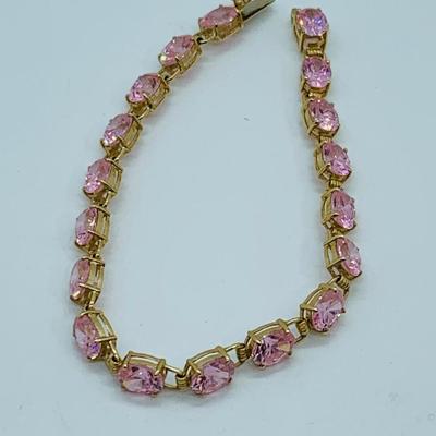 LOT 55: Pink Gemstone 7" 14K Gold Tennis Bracelet - 11 gtw