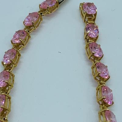 LOT 55: Pink Gemstone 7" 14K Gold Tennis Bracelet - 11 gtw