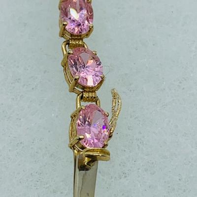 LOT 55: Pink Gemstone 7" 14K Gold Tennis Bracelet - 11 gtw